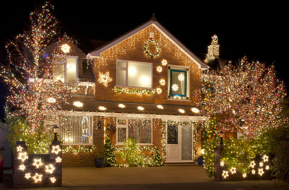 Brick Home Decorated For Christmas