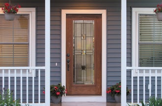 Window World Woodgrain Entry Door in a natural oak stain with a full lite that has monterey glass. Plymouth handleset and deadbolt in aged bronze.
