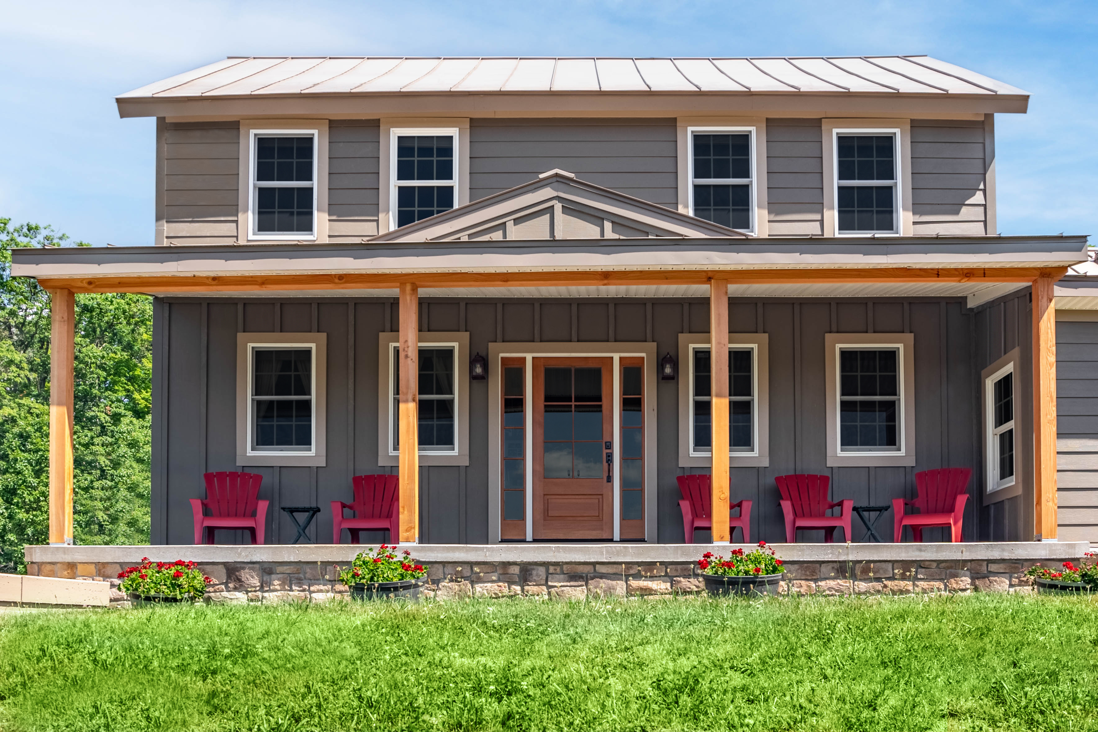 2-story home with hadie plank, panel and trim in Khaki Brown and Timber Bark