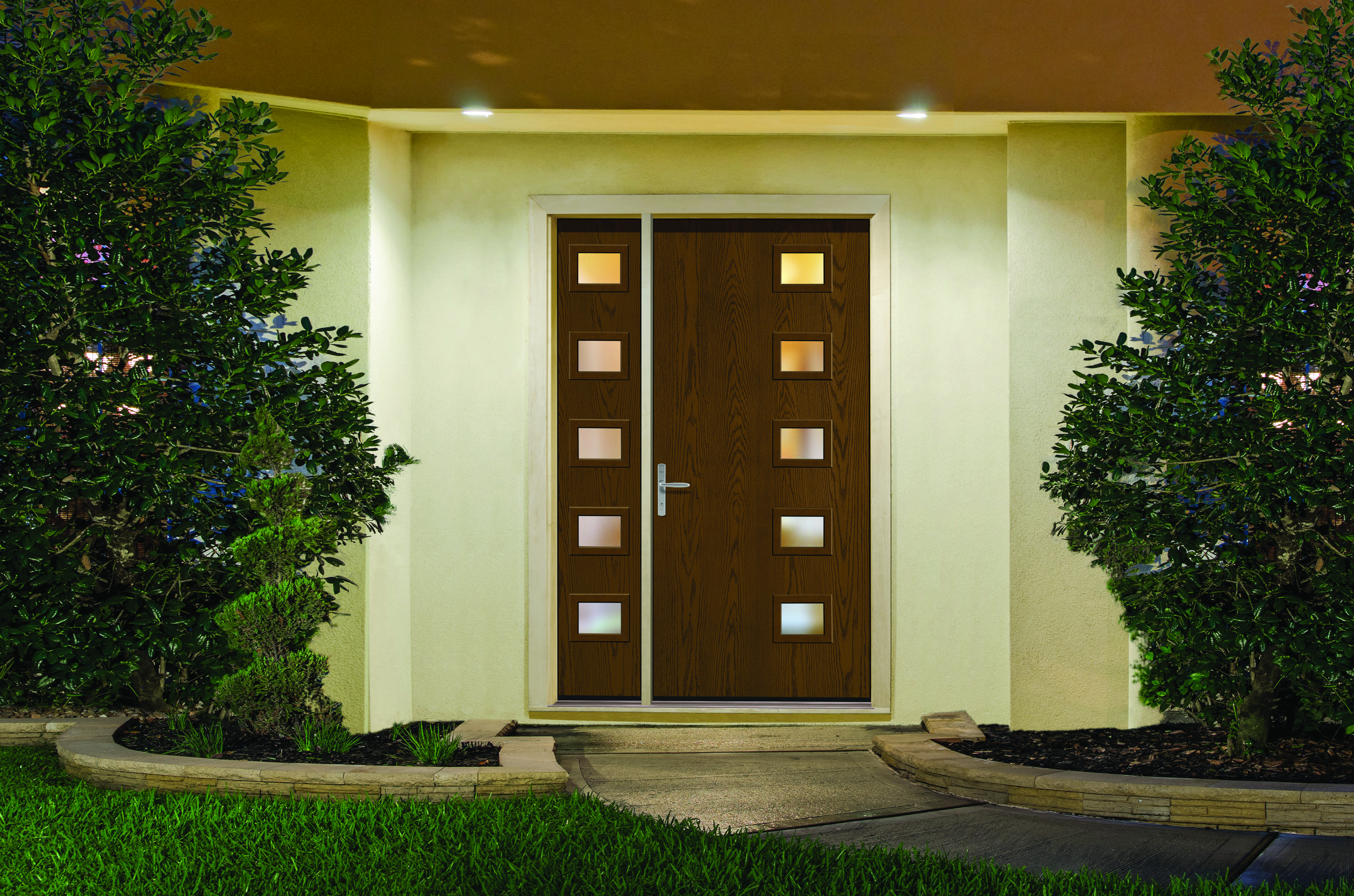 A Barley colored Therma-Tru® Pulse® Modern Entry Door below two recessed lights