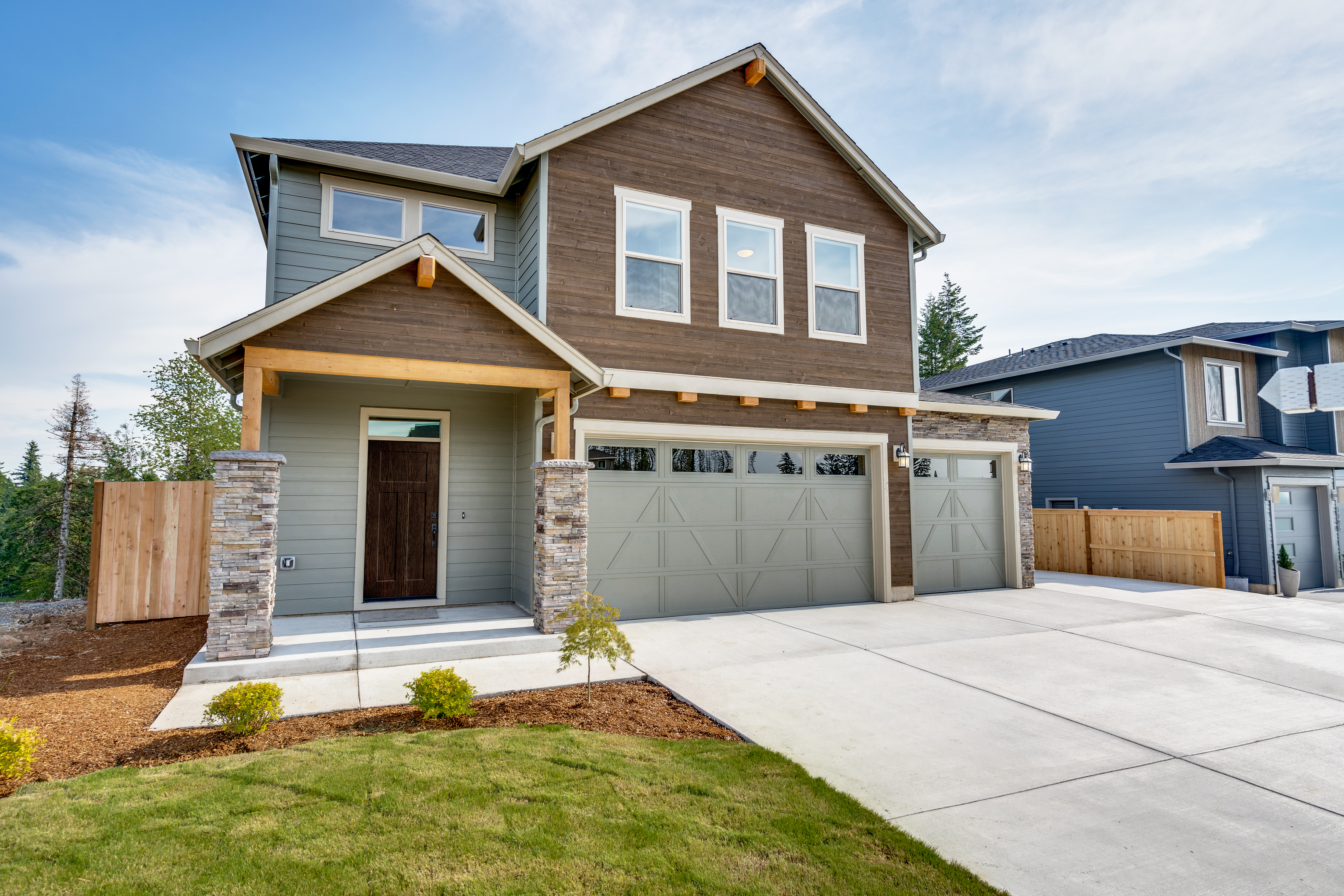 Textured Steel Entry Door, with a 3-Panel Flat Shaker door style, with Addison Handleset hardware in Matte Black.