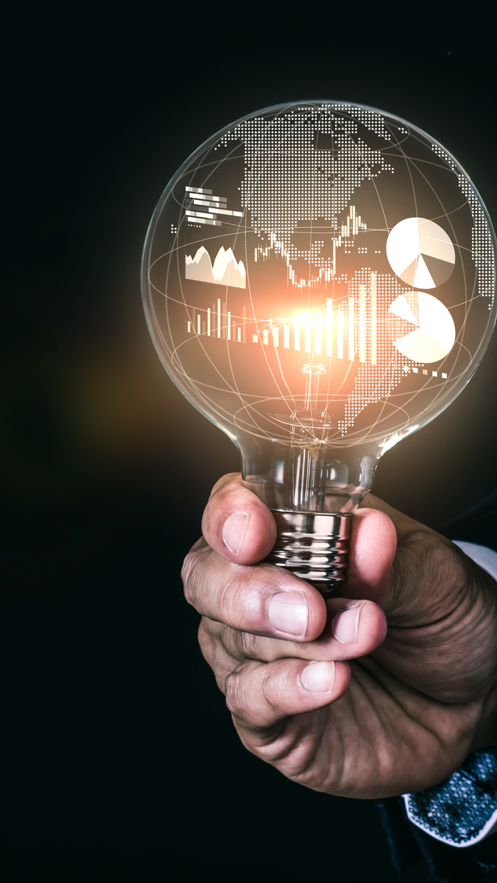 Man holding light bulb