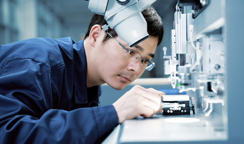Man working in the electronics production