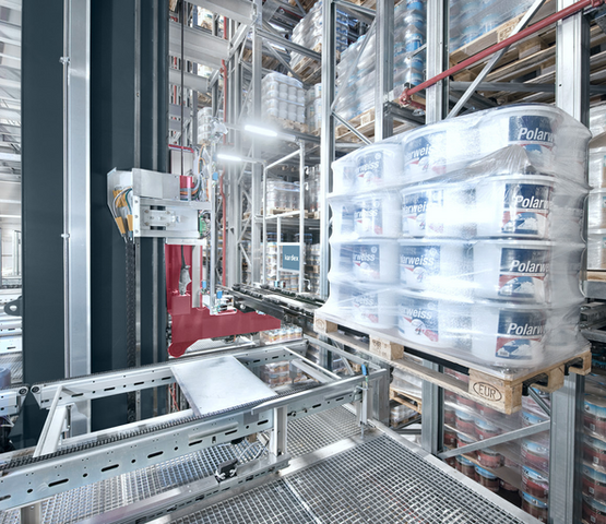 Stacker crane storing a pallet with paint buckets