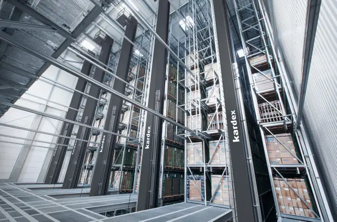 High-bay warehouse with stacker cranes