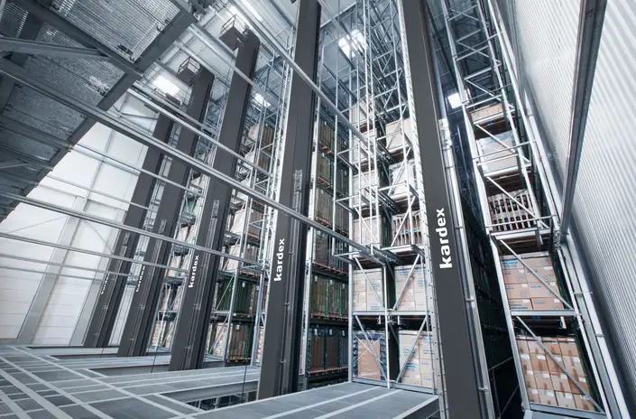 High-bay warehouse with stacker cranes