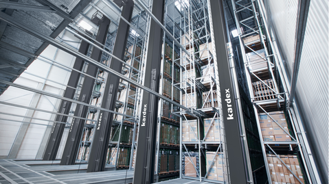 High-bay warehouse with stacker cranes