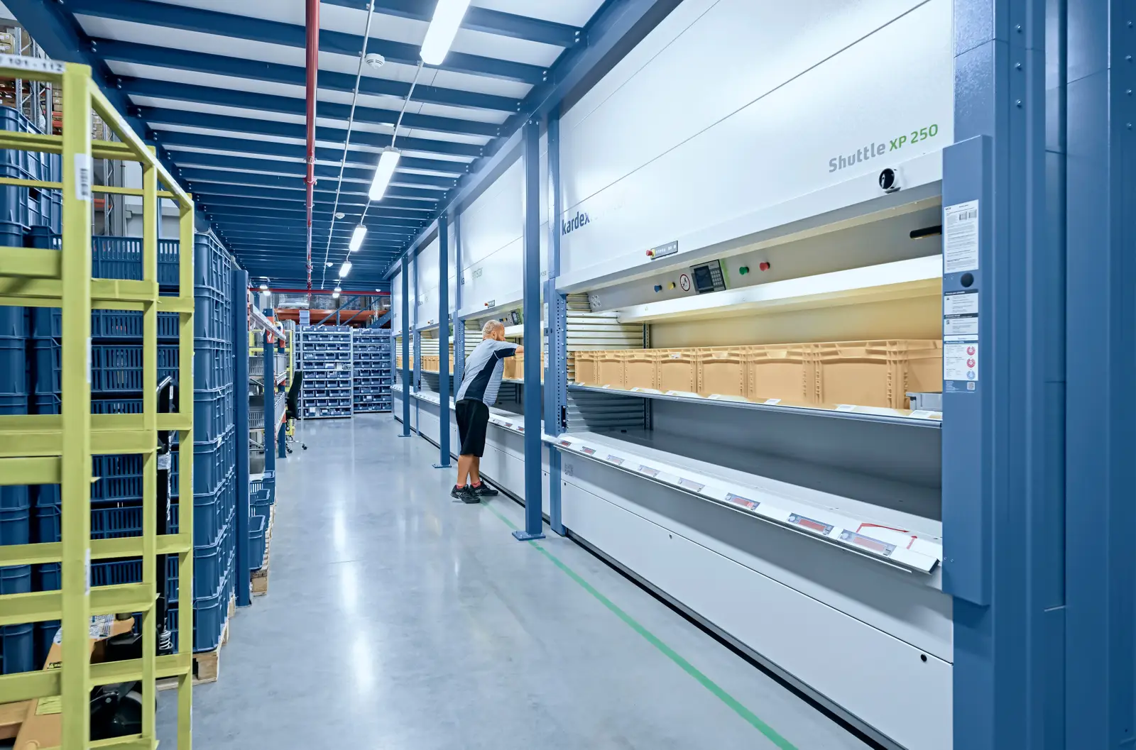 man picks from kardex shuttle veritcal lift module for oil and gas parts