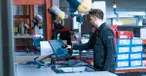 Man picking from AutoStore port