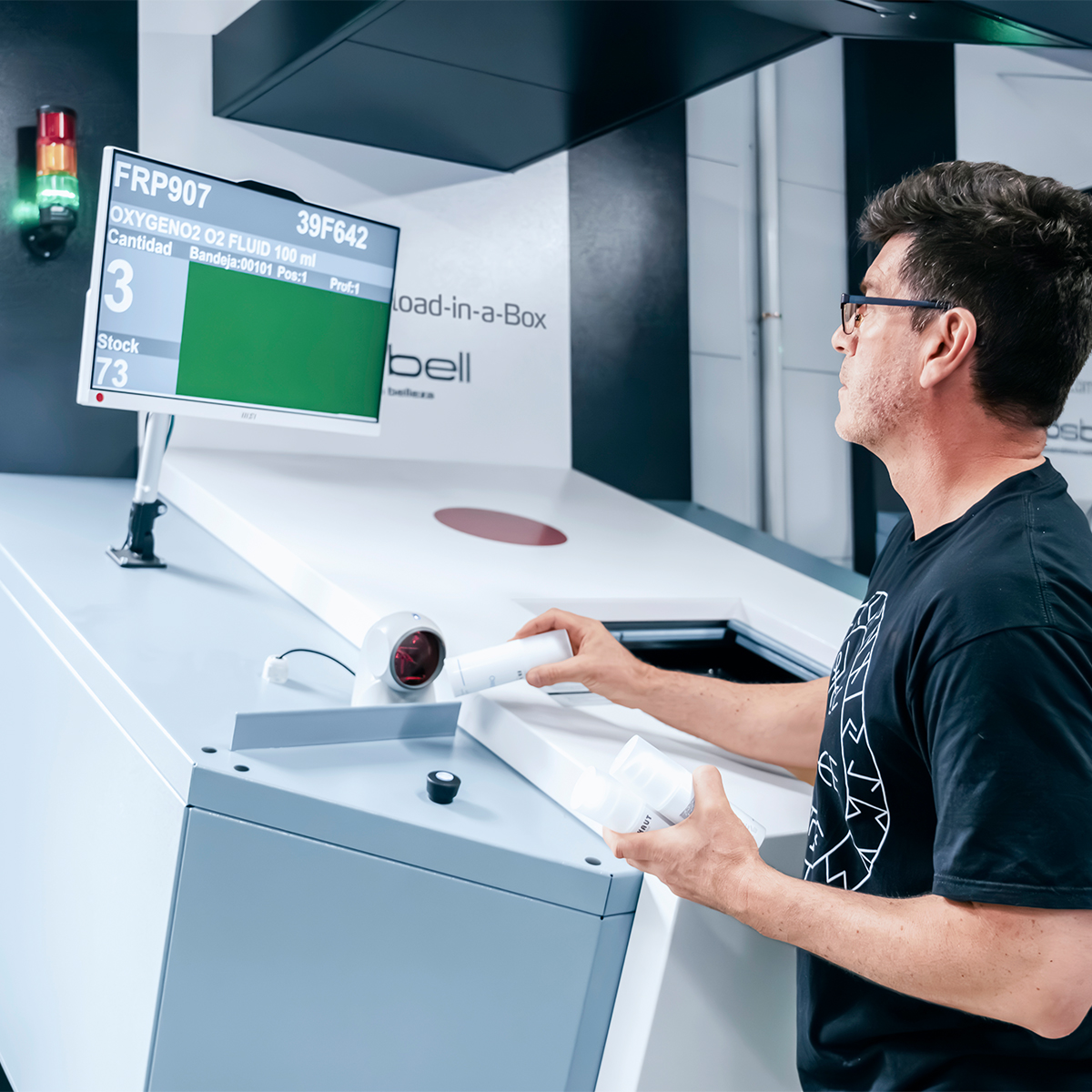 A worker uses Kardex software