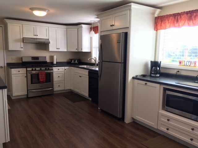 A sleek, modern kitchen with high-end appliances and finishes