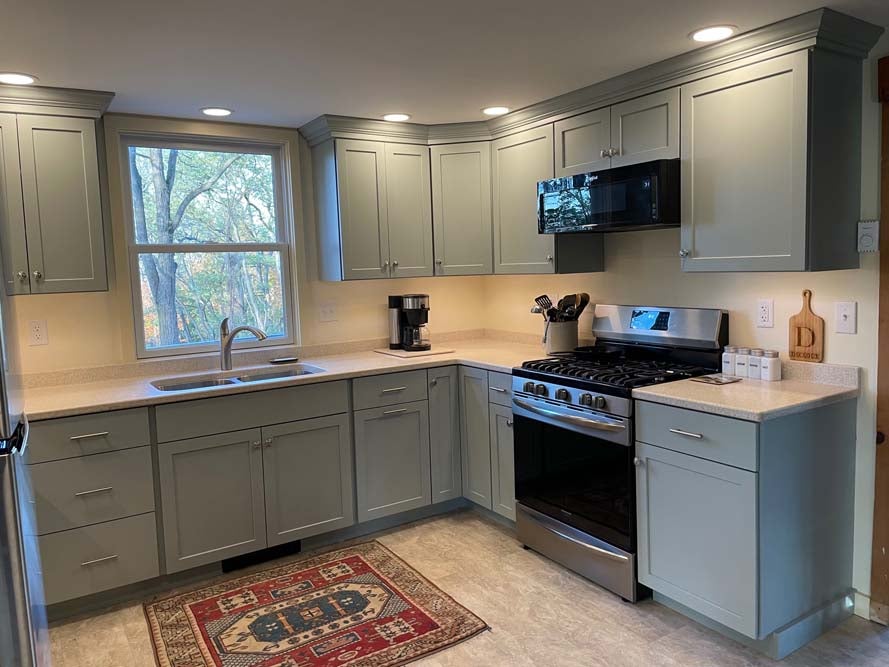 Close-up images showcasing high-quality craftsmanship in kitchen cabinetry, countertops, and tile work