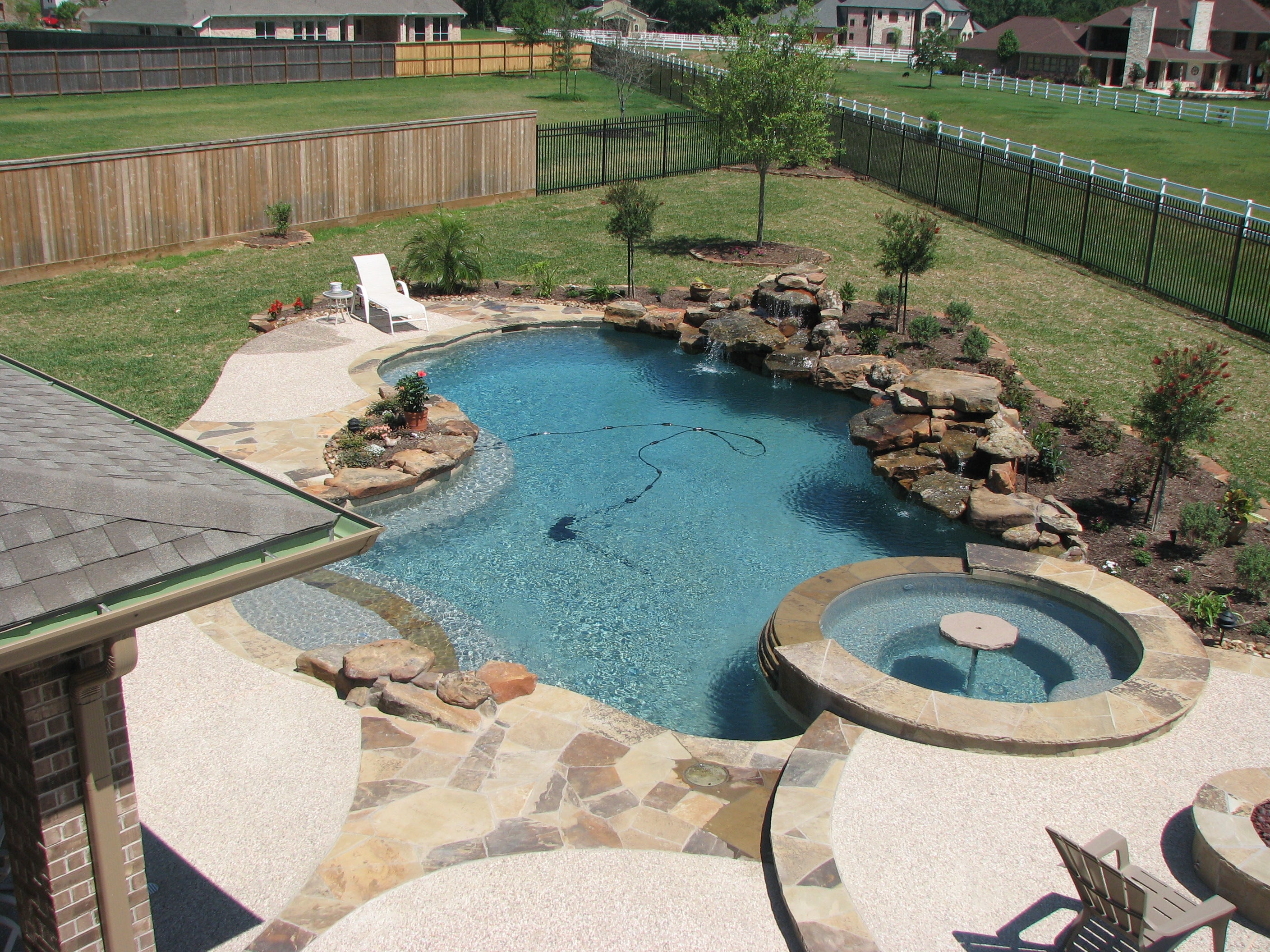 A beautiful pool in a backyard setting in Pearland, TX