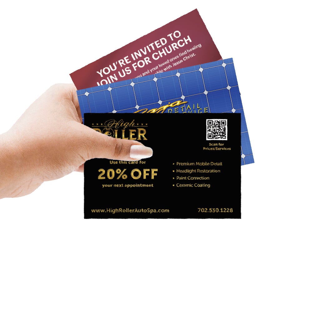 A person holding high-quality printed business cards, showcasing the positive impact of choosing the right printing