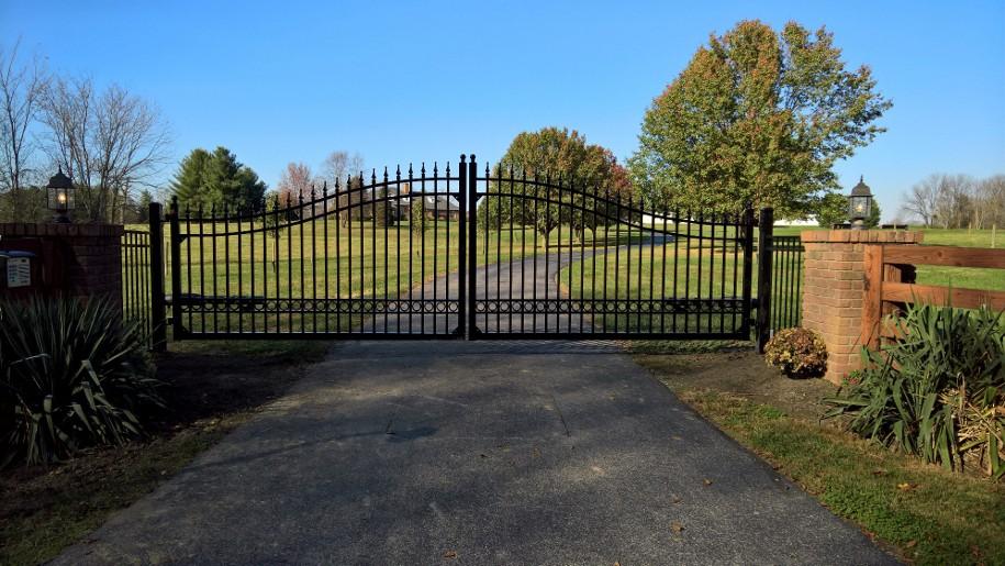 A residential property with a beautifully designed automatic gate at the entrance
