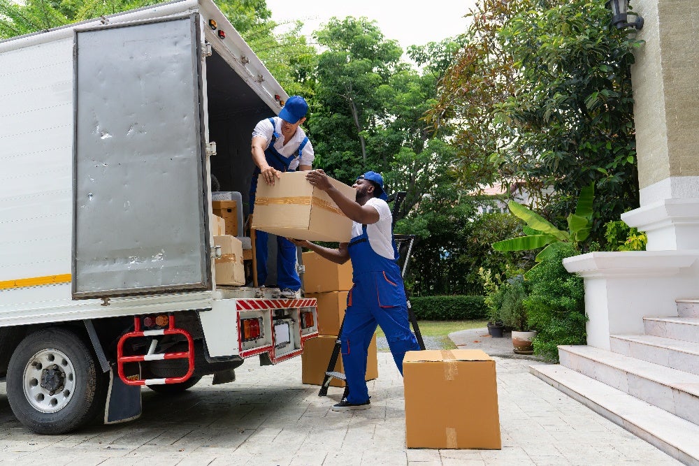 professional movers loading boxes