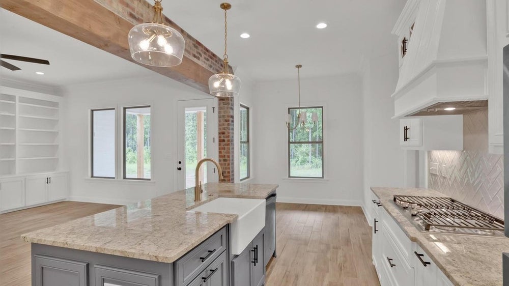 A beautiful custom-built home in Shreveport, LA, showcasing unique architectural features and high-quality craftsmanship