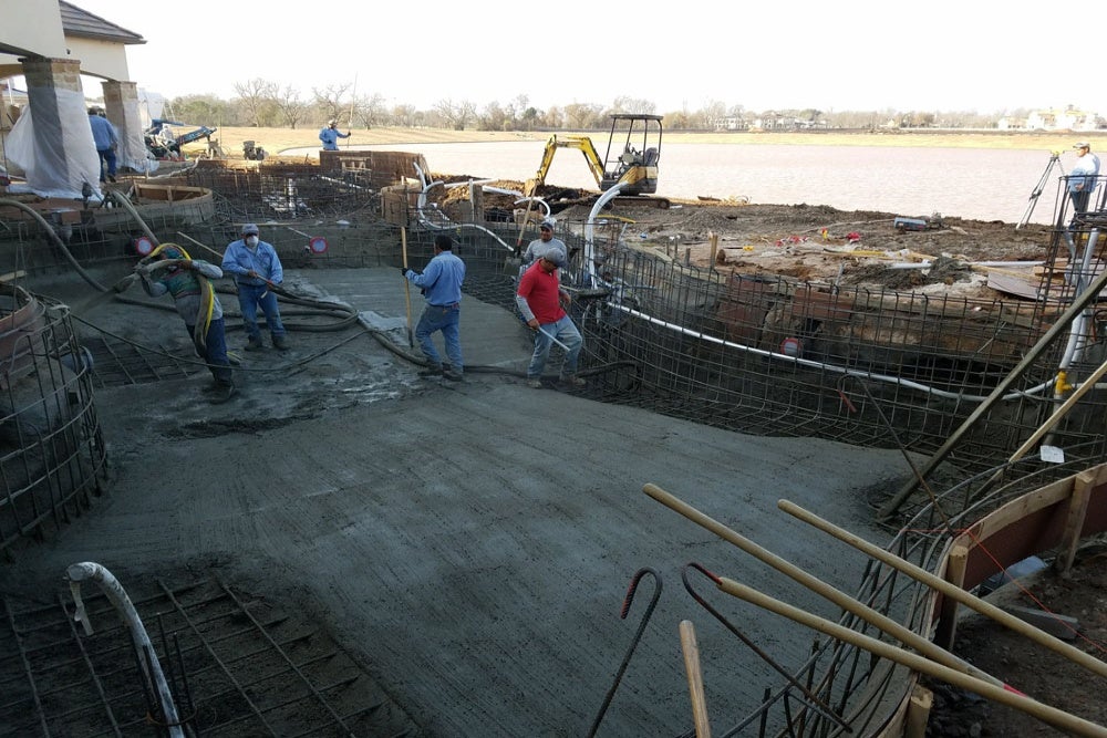 Contractors addressing common pool installation challenges in Pearland