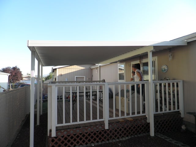 A family enjoying their patio cover in Medford