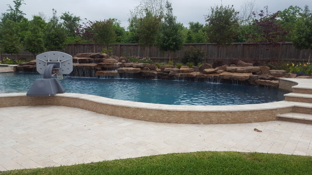 A luxurious pool in a Pearland, TX backyard