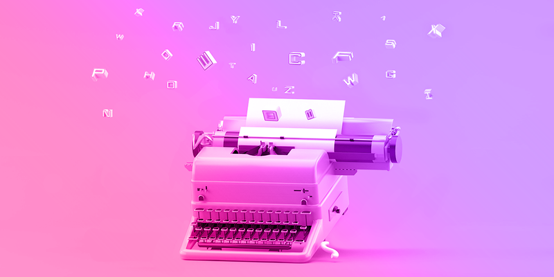 Typewriter with letters flying above it