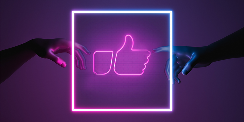 thumbs up on neon sign with michaelangelo fingers