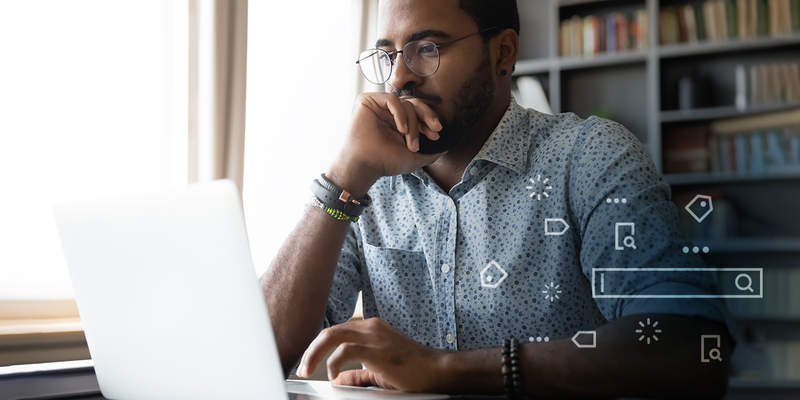Man using computer's search function