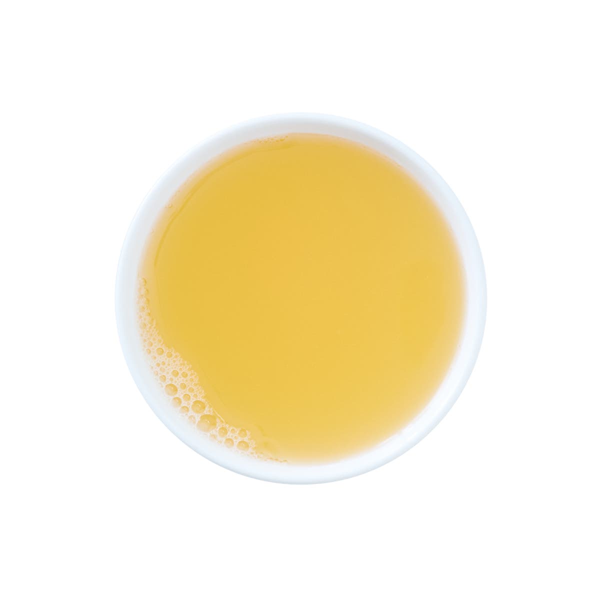 Top view of a white bowl filled with Wild Alaska salmon broth meal supplement, showing a clear, golden-colored liquid with a smooth surface on a white background.