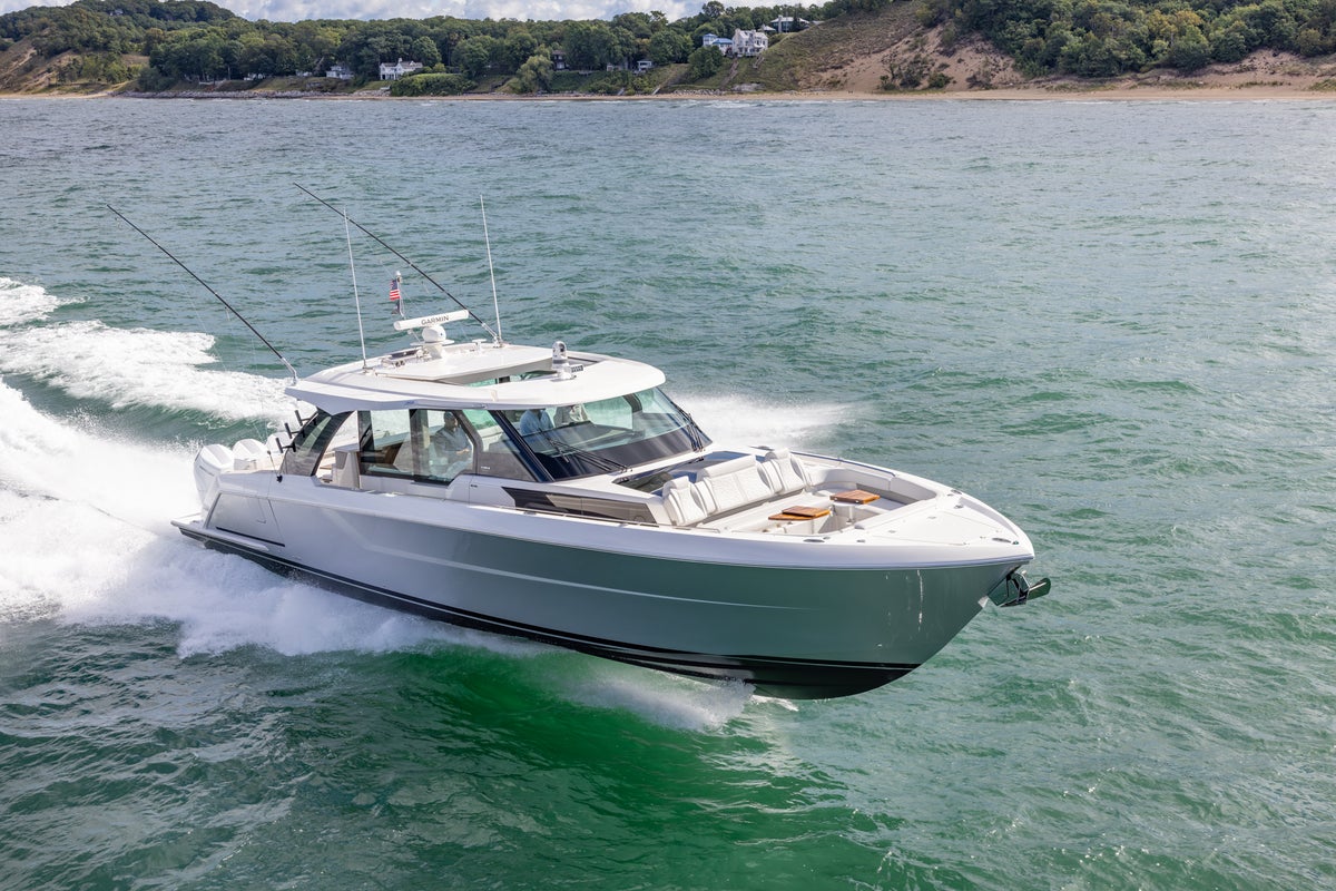 Tiara Yachts 56 LS Running, View of Bow and Starboard Hullside, Hull Color: Stardust, Adventure Module, Wide Open Throttle