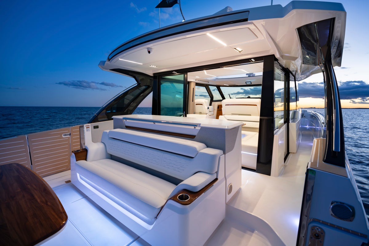 Tiara Yachts 56 LS image of cockpit and salon at dusk