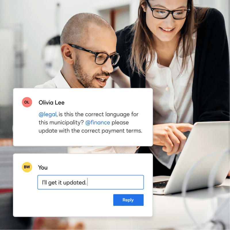 Two people looking at a laptop with a chat conversation