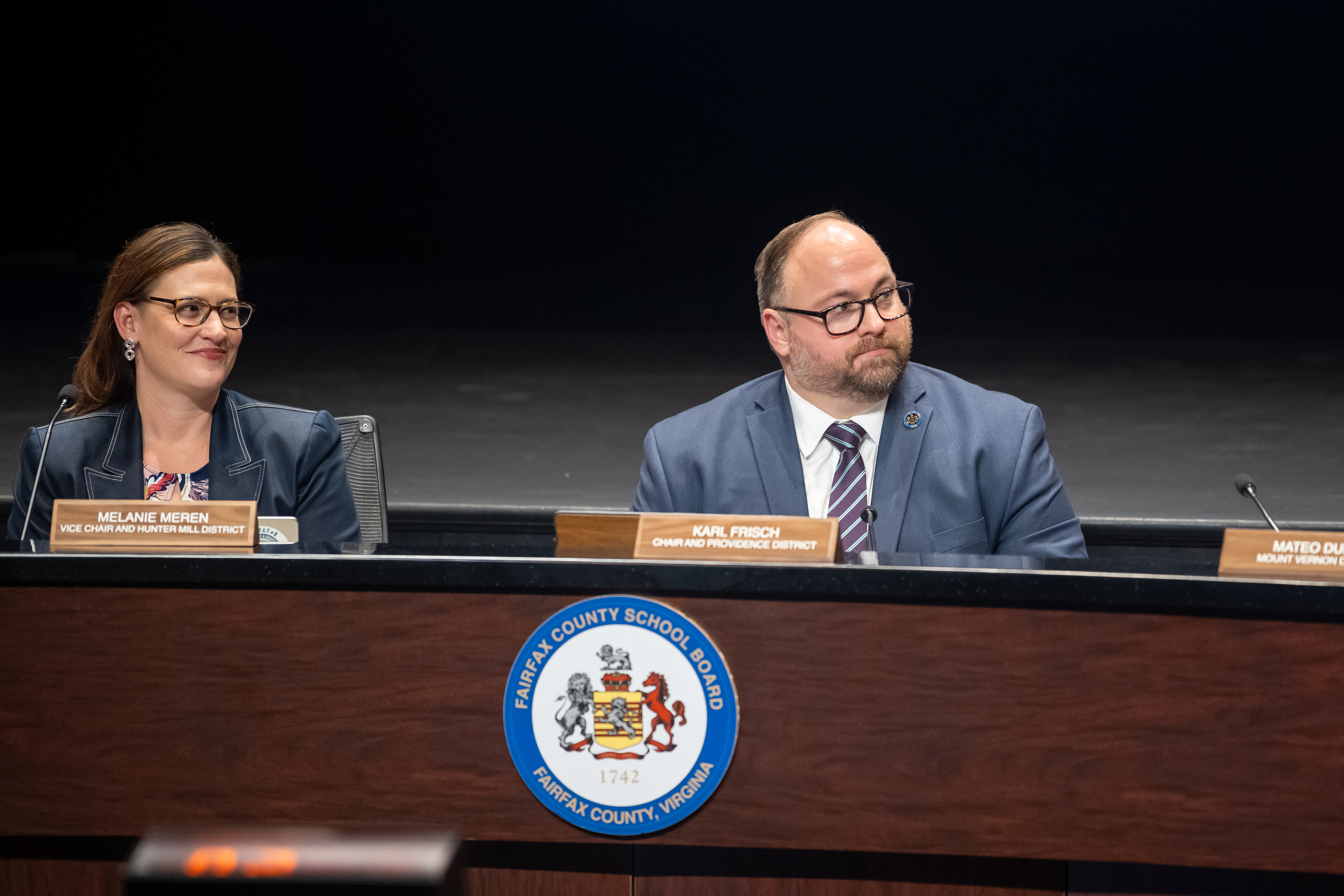 School Board Members listen to a speaker during the July 11, 2024 regular meeting's Community Participation section.