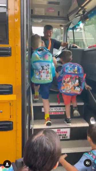 Screenshot of kids getting on a bus