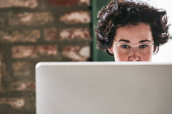 Woman using computer.