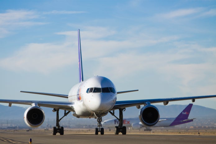 FedEx plane taxiing at airport