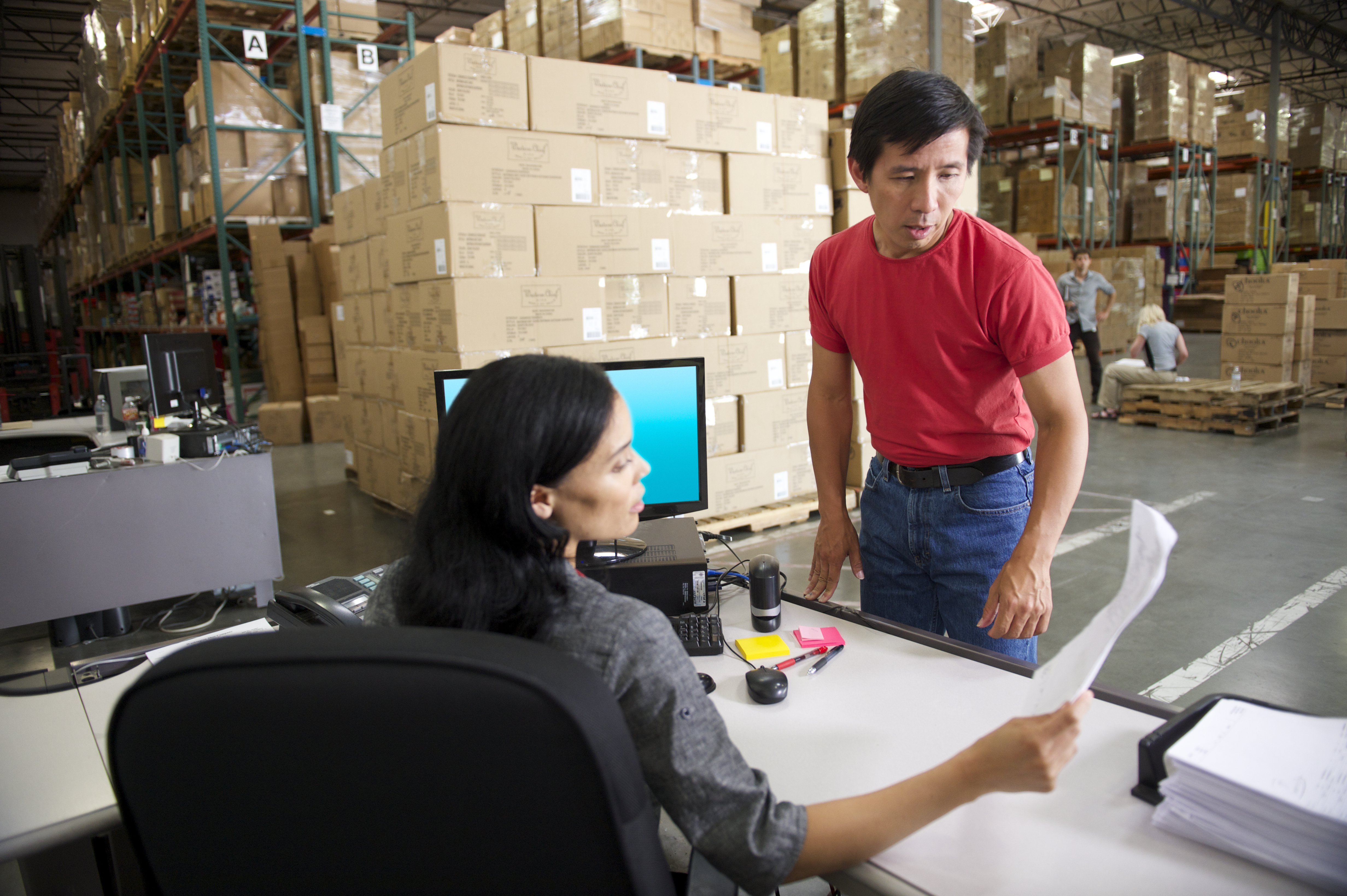 FedEx employees working in warehouse
