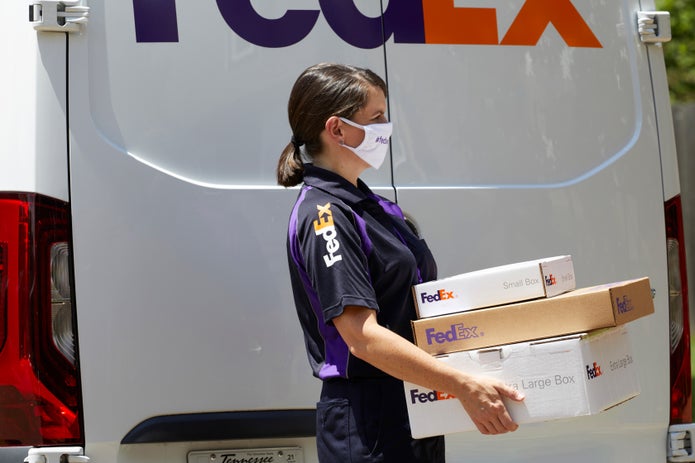 fedex courier with mask