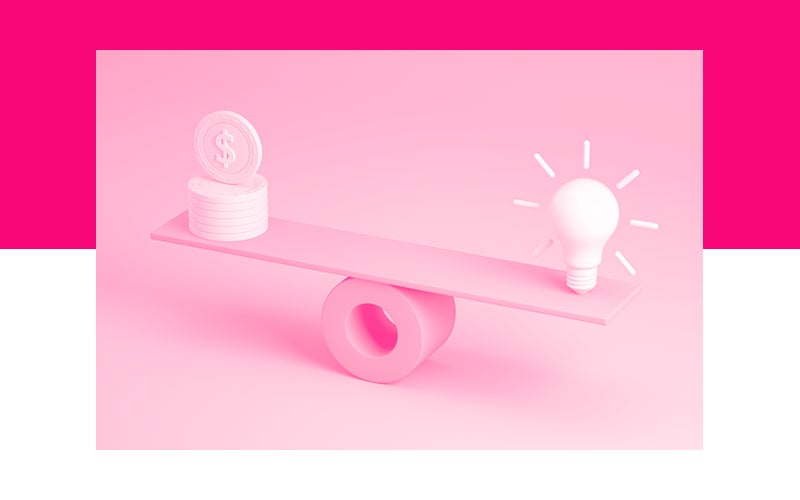 A board balancing on a cylinder with coins on one end of the board and a lightbulb on the other end