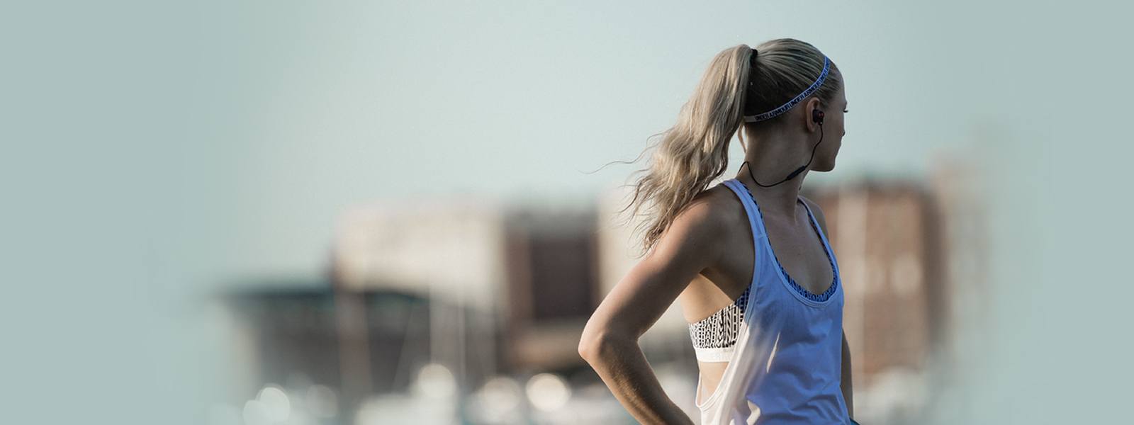 female athlete looking behind her