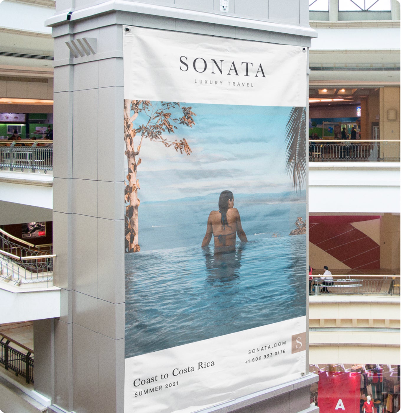 A banner for Sonata brand on the side of a shopping center