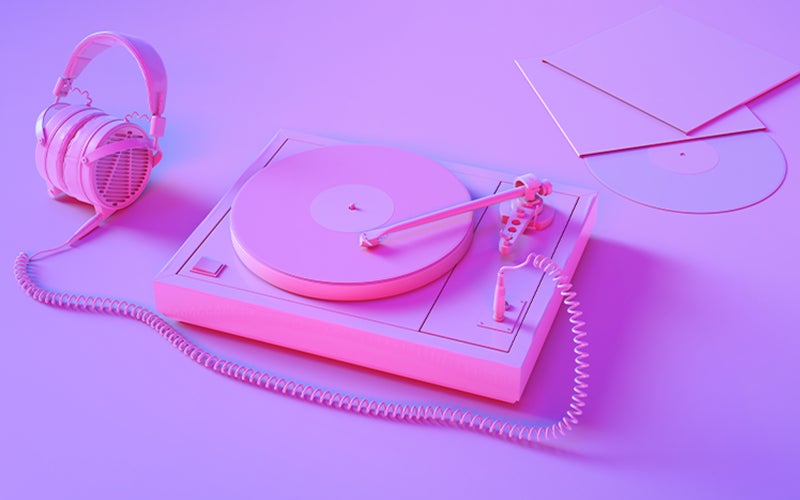 pink headphones on purple background
