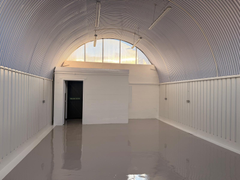 An empty arch with white lining