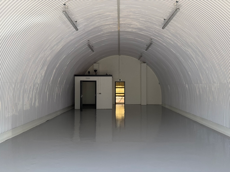An empty arch with white lining