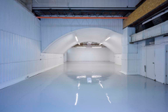 An empty arch with white lining