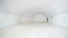 An empty arch with white lining