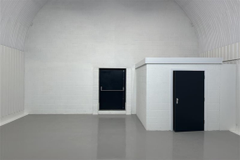 An empty arch with white lining