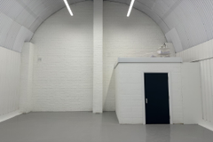 An empty arch with white lining