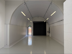 An empty arch with white lining