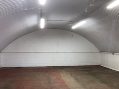 An empty arch with white lining
