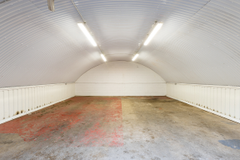 An empty arch with white lining